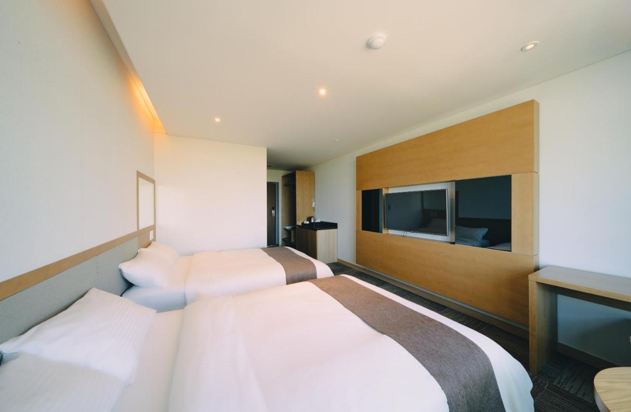 Jeju Poong Gyung Hotel Seogwipo Chambre photo