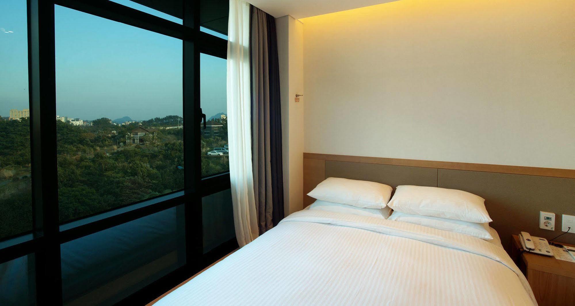 Jeju Poong Gyung Hotel Seogwipo Extérieur photo