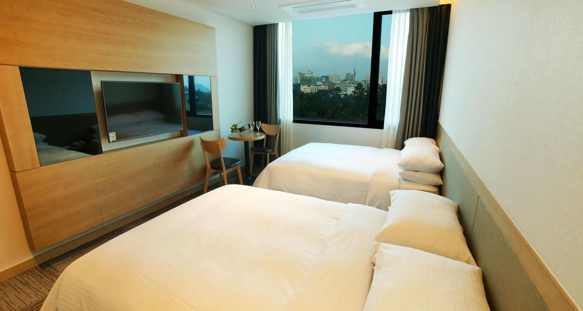 Jeju Poong Gyung Hotel Seogwipo Extérieur photo
