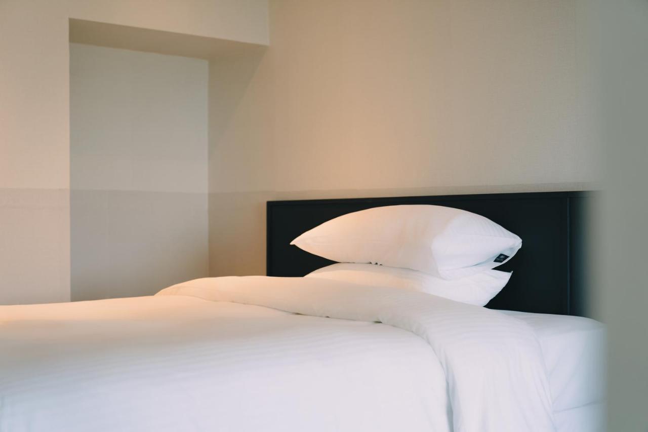 Jeju Poong Gyung Hotel Seogwipo Extérieur photo