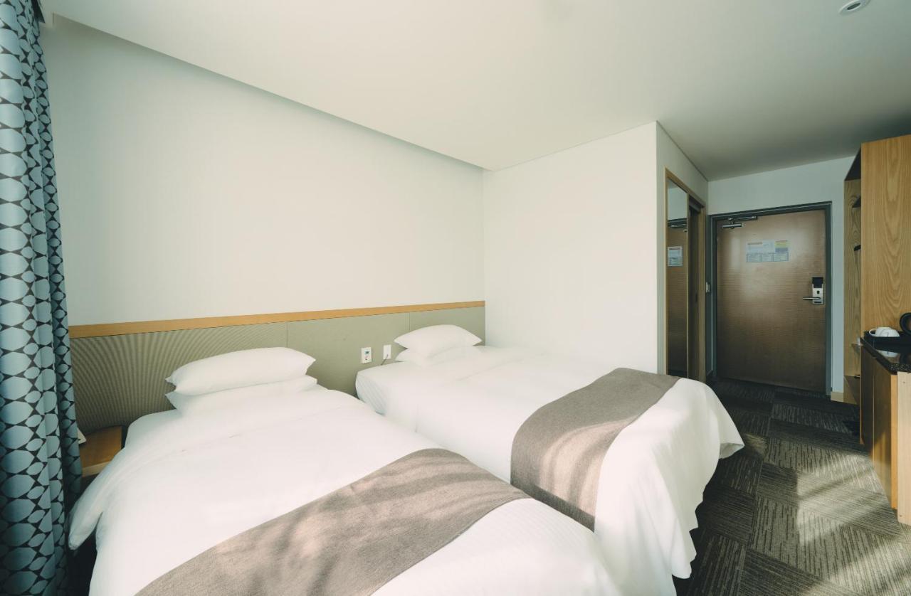 Jeju Poong Gyung Hotel Seogwipo Extérieur photo