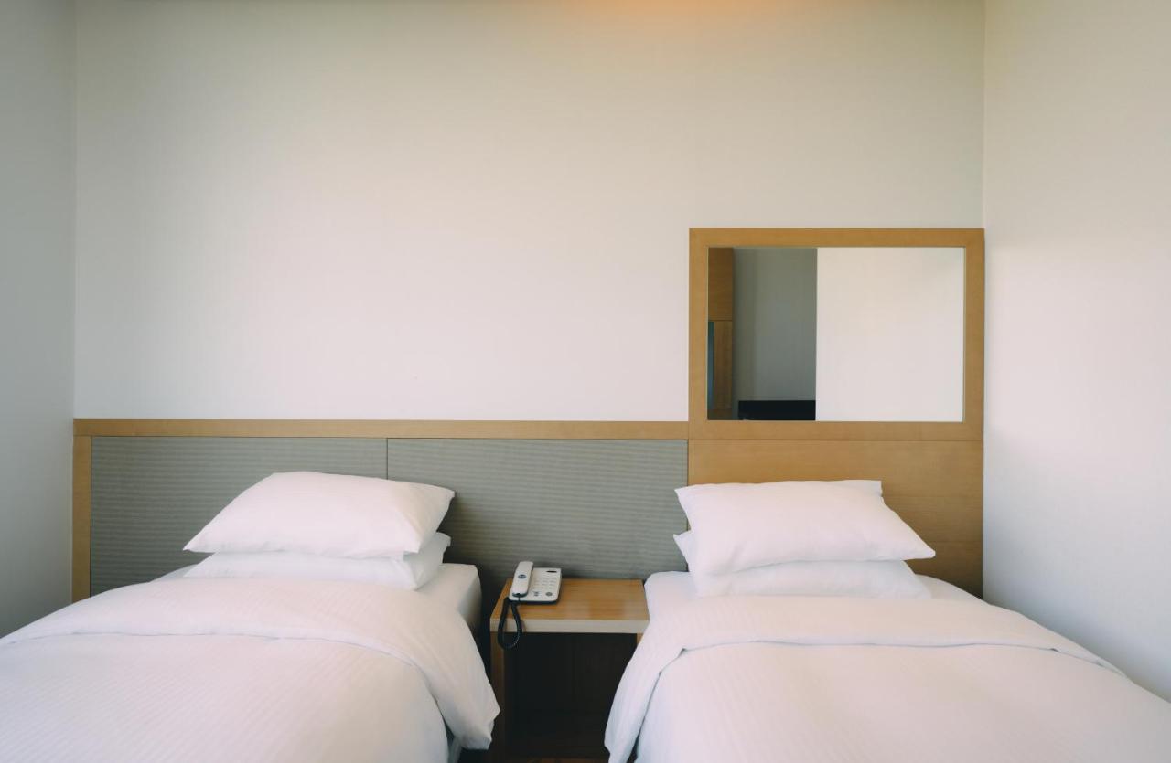 Jeju Poong Gyung Hotel Seogwipo Extérieur photo