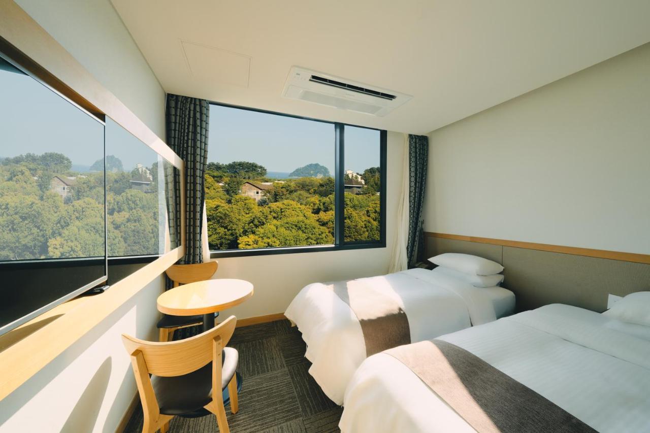 Jeju Poong Gyung Hotel Seogwipo Extérieur photo